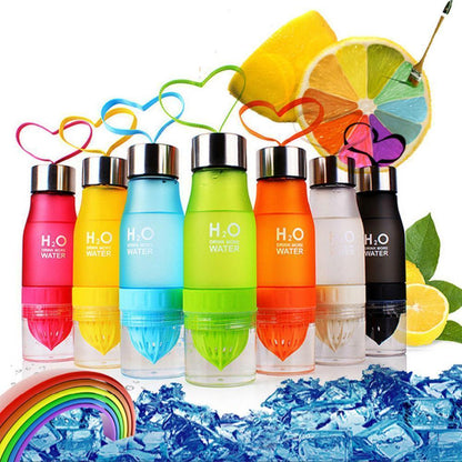 H²O Fruit Infuser Water Bottle collection in various colors with fruits and ice, perfect for hydration.