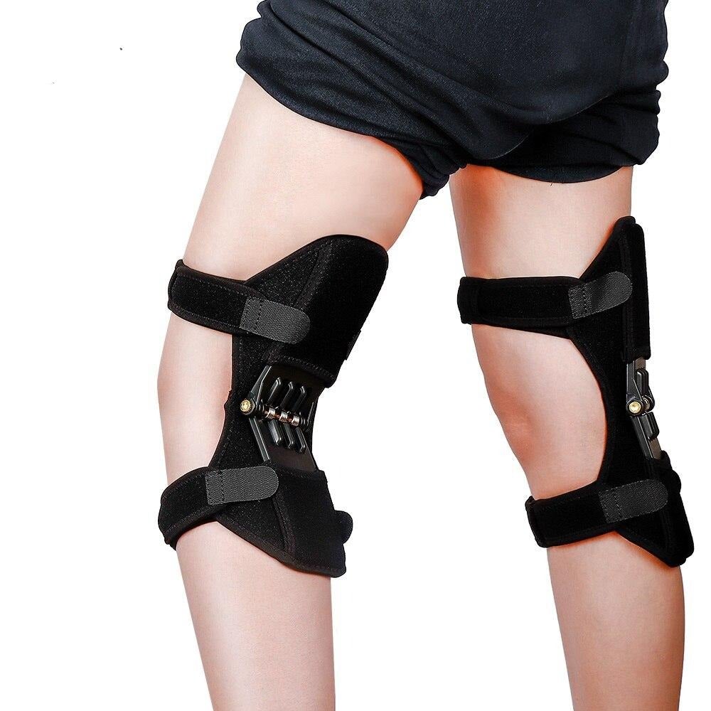 PowerLift Knee Support Pads worn on legs for knee support and pressure reduction.