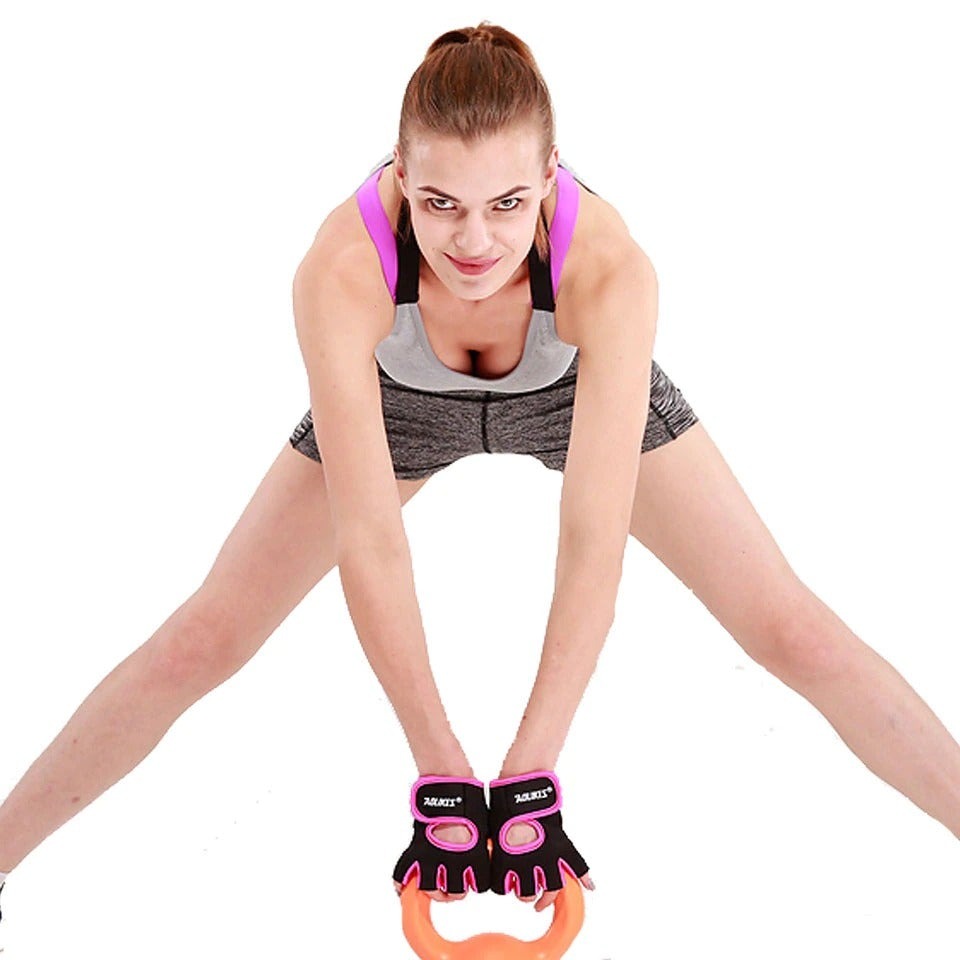 Anti-Slip Half Finger Gym Gloves worn by a woman lifting a kettlebell in an athletic setting.