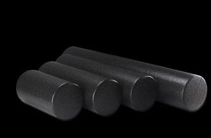 Yoga Foam Roller - Fitness Equipment set of four black foam rollers for muscle recovery and flexibility training.